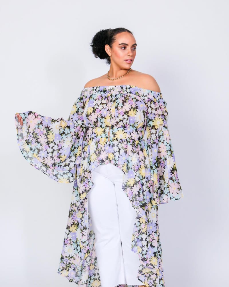Front of a model wearing a size L Abba Off The Shoulder Duster in Daisy Print by LuvMeMore. | dia_product_style_image_id:266546